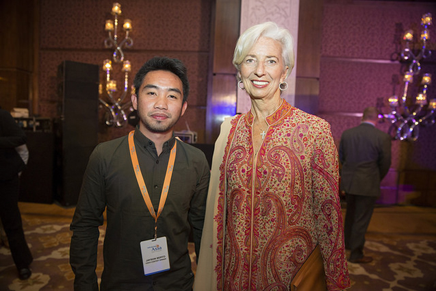 PhilRice videographer Jayson C. Berto poses with International Monetary Fund Managing Director Christine Lagarde during the awarding ceremony at the Taj Palace Hotel in New Delhi, India, 11 March. IMF Staff Photo/Stephen Jaffe 